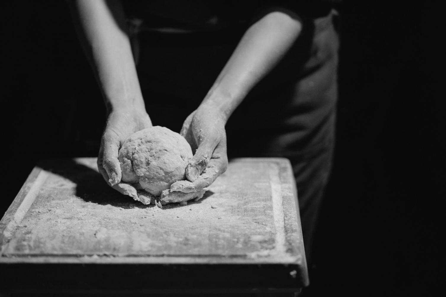 Professional celebration food setup process showing attention to arrangement and presentation quality
